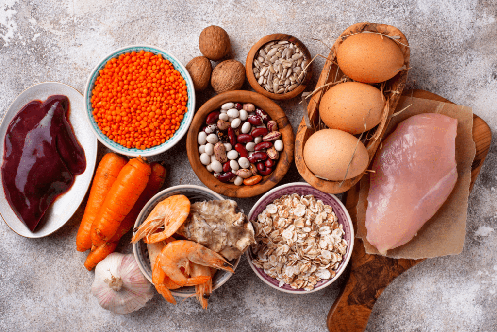 A table topped with bowls of food and eggs.